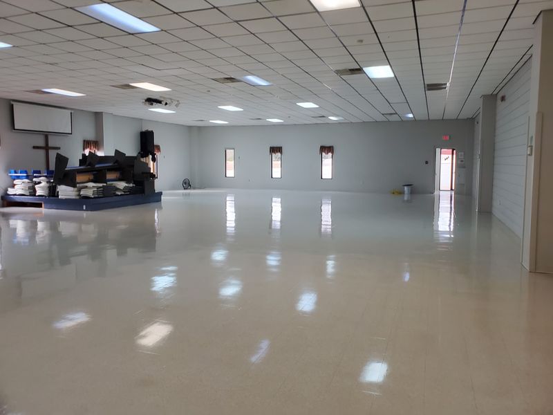 Open hall tile floor after strip and wax