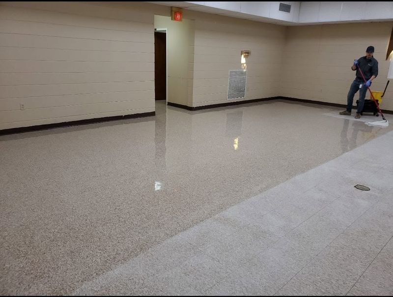 Freshly polished hallway floor in a commercial building cleaned by Knight's Services